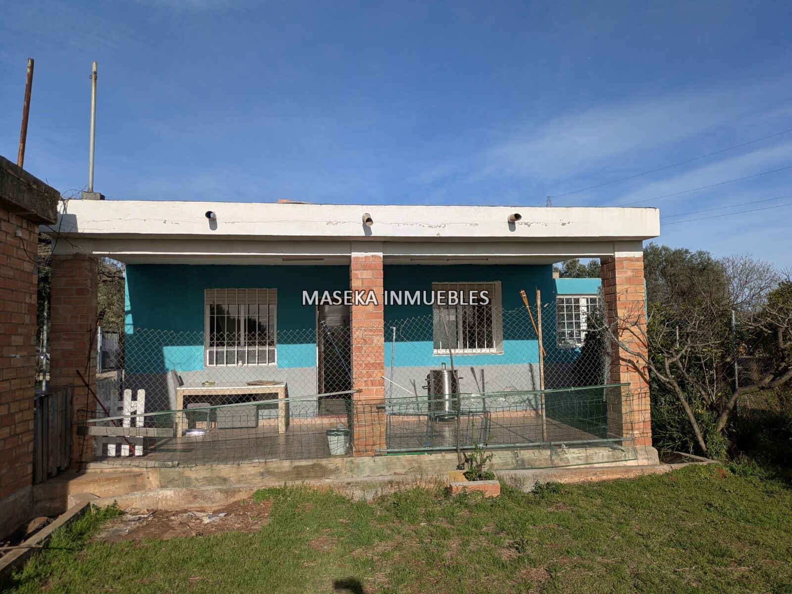 CASA URBANA SOBRE SUELO RÚSTICO